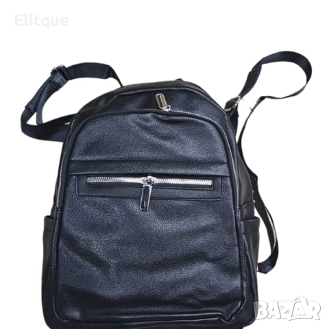 Дамска черна раница с един голям джоб и два по-малки  