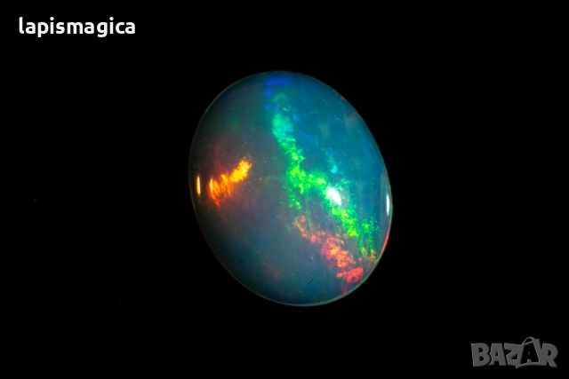Етиопски опал 0.82ct 9x7mm овален кабошон, снимка 2 - Други - 52135226