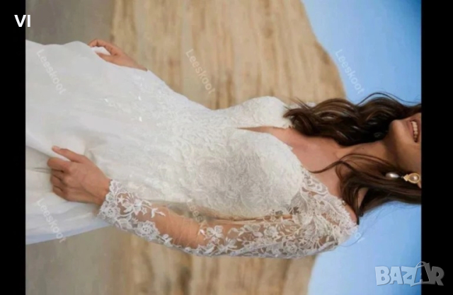 Сватбена рокля с дантелени ръкави и регулиращо се закопчаване