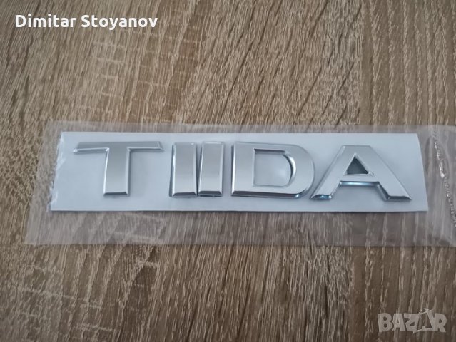 Надпис емблема лого Нисан Тийда Nissan TIIDA