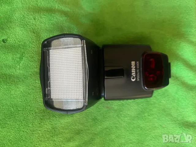 Светкавица Canon 430 EX, снимка 4 - Светкавици, студийно осветление - 47736547