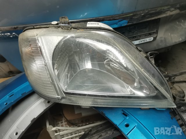 Десен фар Дачия Логан, снимка 4 - Части - 35381376