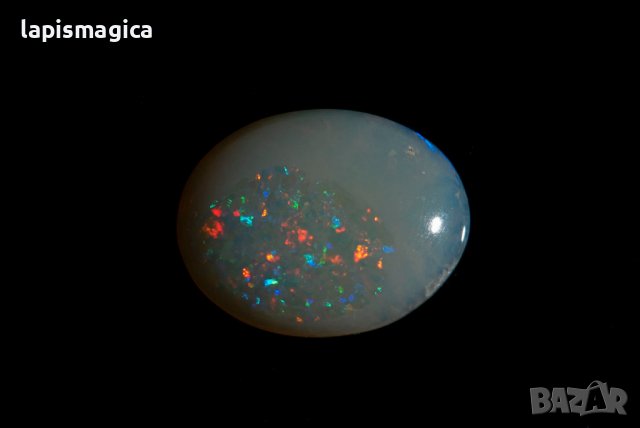 Австралийски кристален опал 0.98ct овален кабошон, снимка 2 - Други - 42909337
