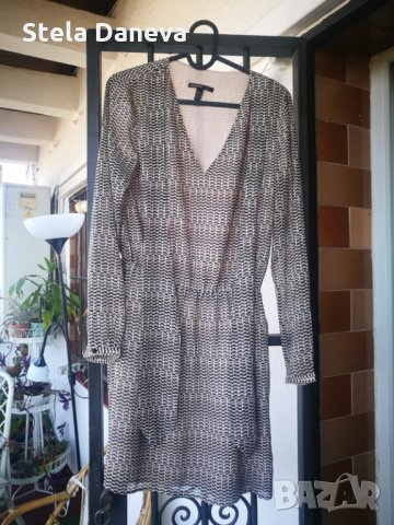 Елегантна маркова рокля на Манго