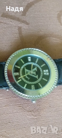 Часовник Louis Vuitton