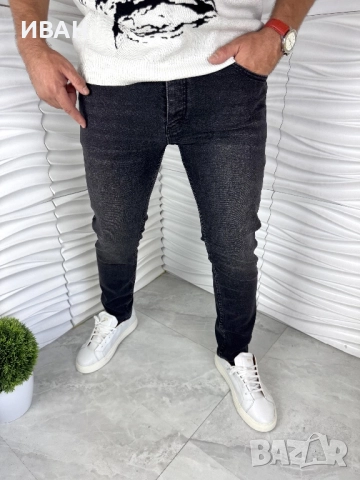 Мъжки дънки в черен цвят с лек избелял ефект