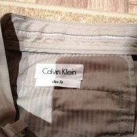Мъжки панталон Calvin Klein slim fit - 32 размер, снимка 2 - Панталони - 34409611