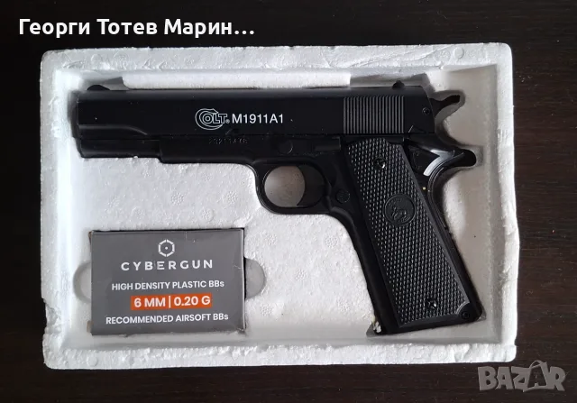 Въздушен пистолет,Спрингов еърсофт пистолет с топчета Cybergun COLT M1911 A1