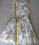 Детска официална рокля next 134 , 9 г., снимка 1 - Детски рокли и поли - 36568074