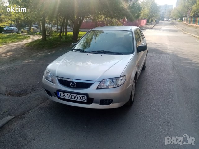 Мазда 323 бензин нова газова инсталация перфектно състояние, снимка 2 - Автомобили и джипове - 40454059
