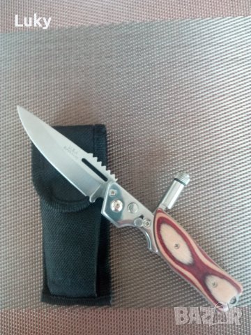 Продавам стилeн , красив ,автоматичен,сгъваем,за оцеляване нож+фенерче+калъф--USA.