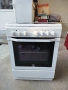 Свободно стояща готварска печка Indesit стъклокерамичен плот, снимка 2