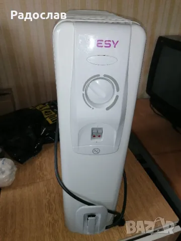 Маслен радиятор на фирмата Tesi. , снимка 2 - Отоплителни печки - 47999610