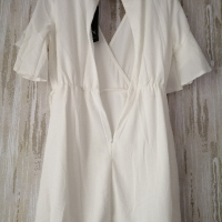 AX PARIS нова дамска рокля с волани в бял цвят р-р M/L (EU 40 - UK 12), снимка 15 - Рокли - 44599319