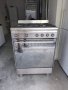 Професионална готварска печка SMEG CX60EMS8 с котлони на газ и фурна на ток