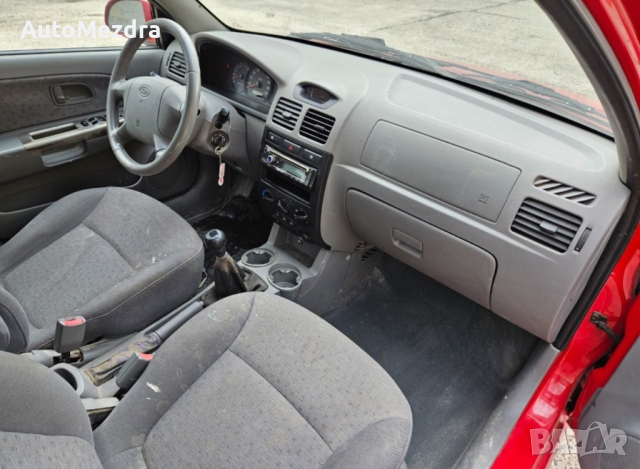 Kia Rio  1.4i klim, снимка 6 - Автомобили и джипове - 44621415