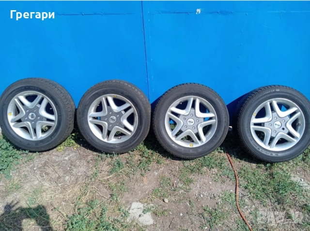 Продавам джанти за Аudi A4  с летни гуми с размер 205/60 R15, грайфер 6,5 мм. 