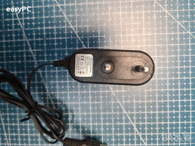 Оригинален захранващ адаптер 005D05 5V 1A, снимка 2 - Друга електроника - 47925119