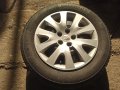 Комплект четири броя гуми с метални джанти и тасове оригинални 15 Subaru impresa, снимка 3