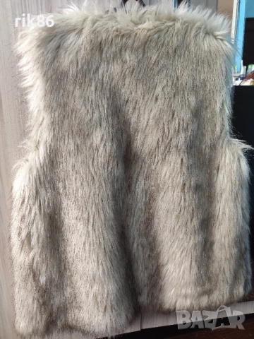 Дамски пухен елек, снимка 2 - Елеци - 51778125