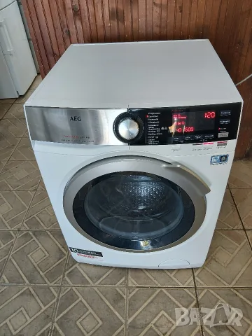 Като нова комбинирана пералня със сушилня Аег Aeg 7000 Series 10/6 кг с две години гаранция! 
