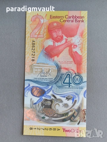 Банкнота - Източни Кариби - 2 долара (юбилейна) UNC | 2023г., снимка 3 - Нумизматика и бонистика - 53130733