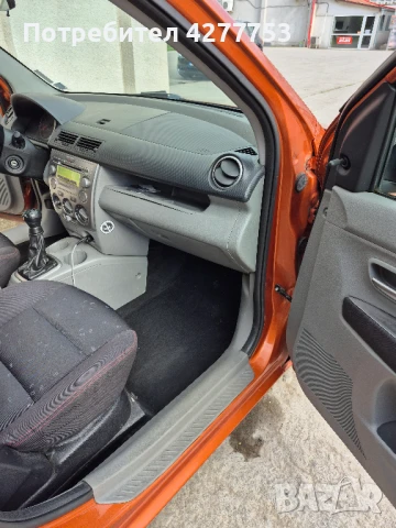 Продавам Мазда 2, категория хечбек, октомври 2003, цвят оранжев, снимка 9 - Автомобили и джипове - 50930283