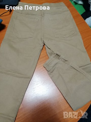 Нови бежови панталони с ластик размер 150, снимка 3 - Детски панталони и дънки - 22651319