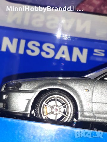 NISSAN  SKYLINE GT-R R 34 V spec AUTOart 1.43  Top Model , снимка 18 - Колекции - 39258739