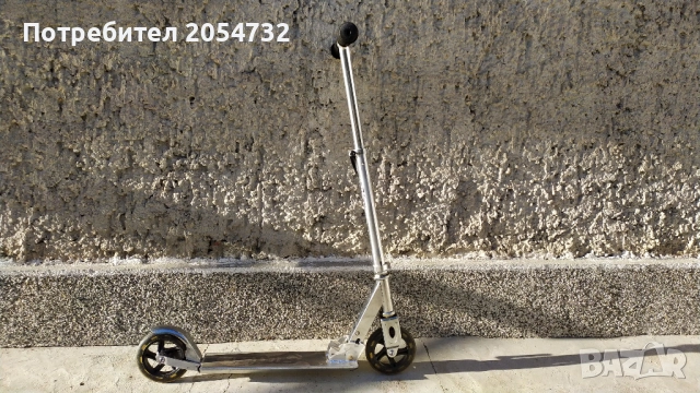 Сгъваема тротинетка с крачна спирачка