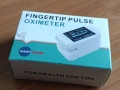 Пръстов оксиметър за измерване на пулса и сатурацията на кръвта, снимка 1