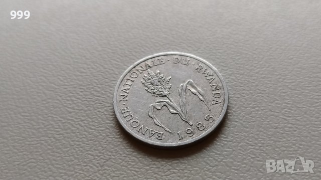 1 франк 1985 Руанда, снимка 2 - Нумизматика и бонистика - 40385462