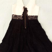 Богата уникална черно и бяло стилна рокля къса с много богата долна част, елегантна ,скъпа материя, снимка 13 - Рокли - 37258618
