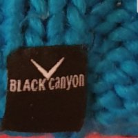 Зимна шапка с пискюл  black canyon Като нова, снимка 4 - Шапки - 34988335