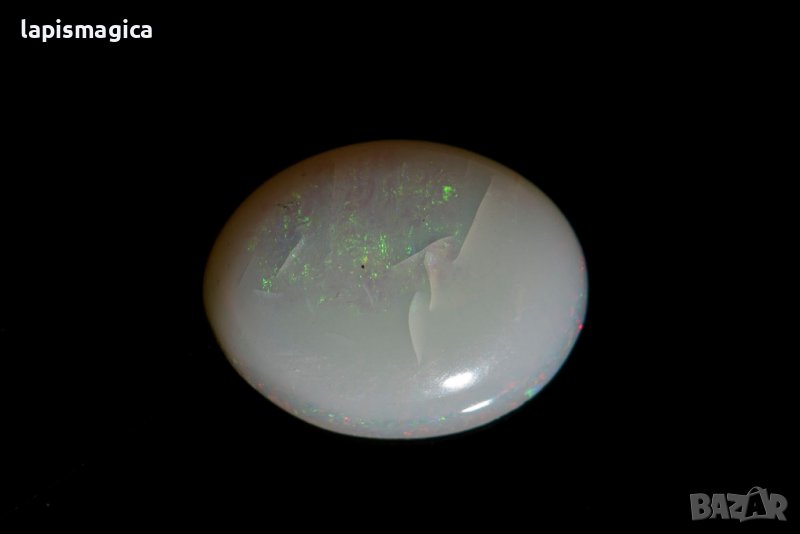 Австралийски кристален опал 1.30ct овален кабошон, снимка 1