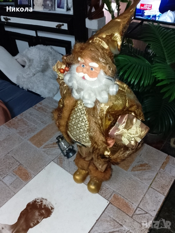 Дядо Коледа в златни одежди,слон от абанос-4кг., снимка 1
