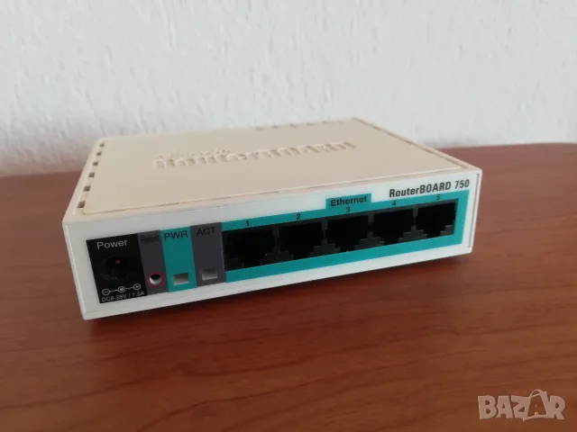 Mikrotik RB750 рутер, снимка 2 - Мрежови адаптери - 56104952