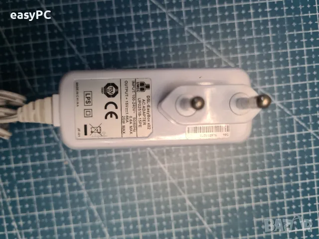 Оригинален захранващ адаптер UMEC DSL - EasyBox x02 15V 1.66A, снимка 5 - Рутери - 48226300