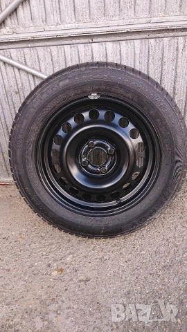 Оригинална резервна джанта 15"с гума за Opel Astra G. 6JX15H2, 4x100,ET49, Ц. О. 56,6мм.