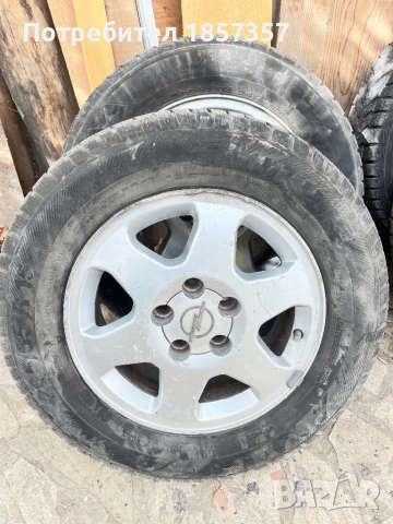 Зимни гуми с оригинални джанти Опел  15 205 65, снимка 15 - Гуми и джанти - 51857736