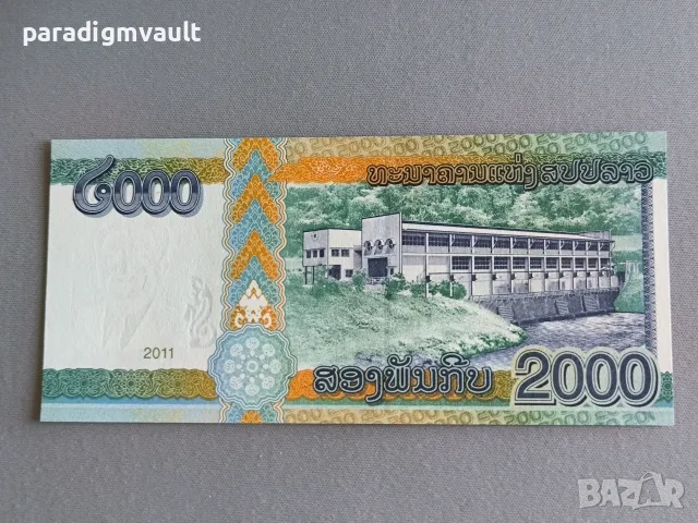 Банкнота - Лаос - 2000 кип UNC | 2011г., снимка 2 - Нумизматика и бонистика - 56155581