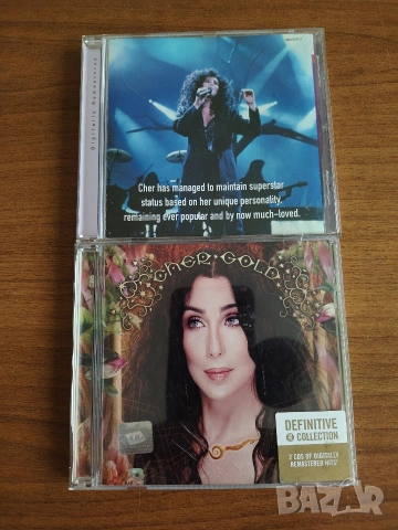 Три компакт диска на CHER