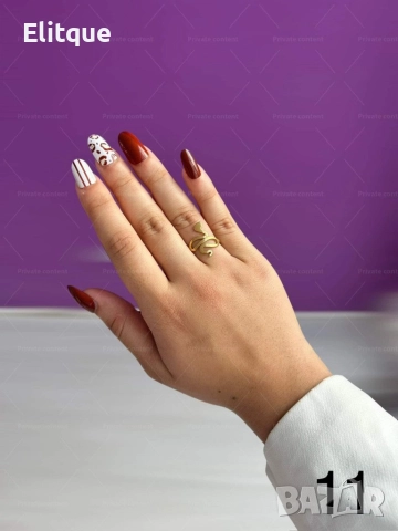 Хубав дамски златист пръстен тип змия от медицинска стомана
