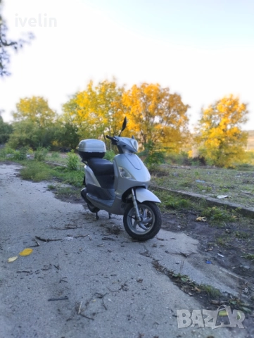 Скутер piaggio fly 125