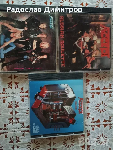 Лот от Три диска на    Accept,     