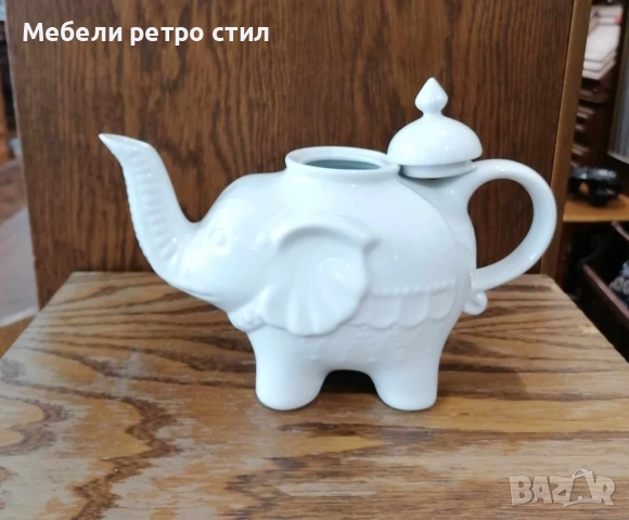 Чайник от бял порцелан, изработен във формата на щастливо слонче с вдигнат хобот и релефни детайли. , снимка 6 - Декорация за дома - 52007567