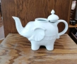 Чайник от бял порцелан, изработен във формата на щастливо слонче с вдигнат хобот и релефни детайли. , снимка 6