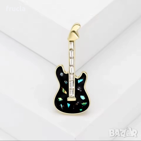Брошки Китари