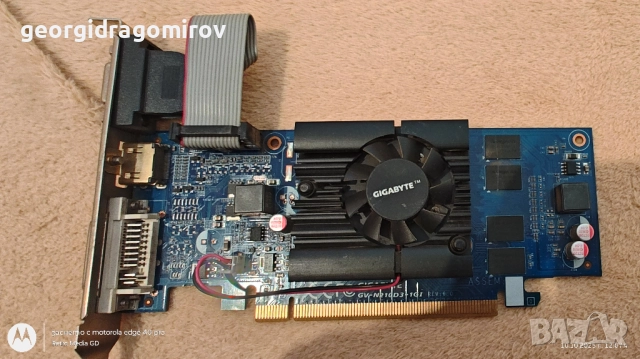 Видеокарта Gigabyte GeForce 210 1GB DDR3 64-bit, снимка 4 - Видеокарти - 52035133