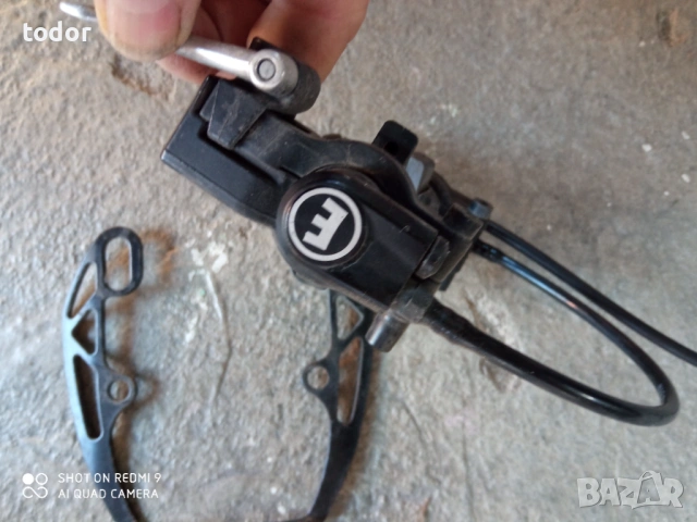 хлдравлична спирачка магура , задна.